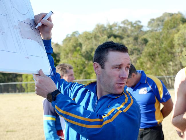 Lilydale coach Ben Neagle gives his instructions. Picture: Steve Tanner