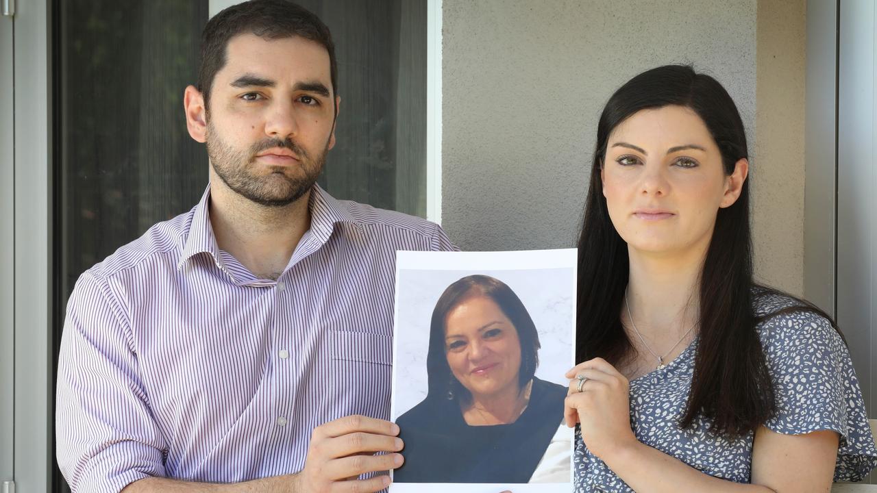 Alessia Masson and her brother Luca Obbiettivo with a photograph of their mother Marina Obbiettivo. Picture: Dean Martin