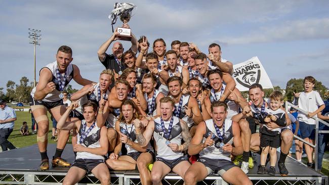 Victorious Southport Sharks celebrate their premiership win. Picture: Jerad Williams