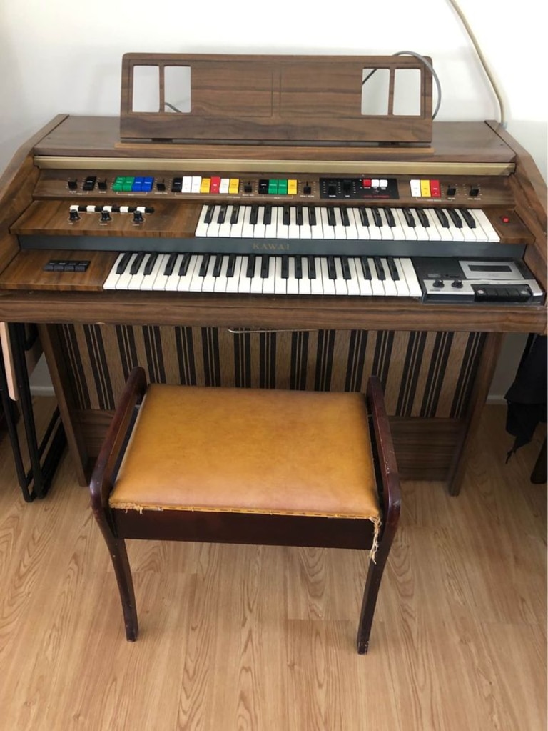 An electric organ on sale for $150.