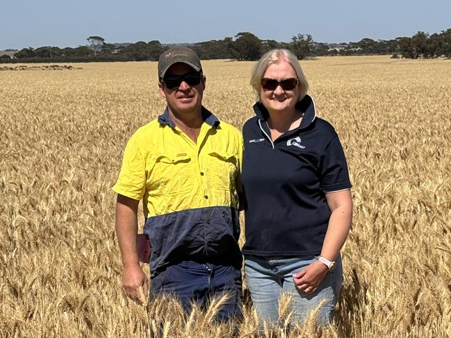 Bruce and Heather Talbot in a crop of wheat on their Western Australian property. Picture: Supplied