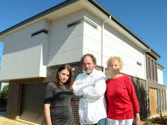 Chris Fleetwood and his daughter Siobahn and mother Shirley Tuck outside their disputed home.