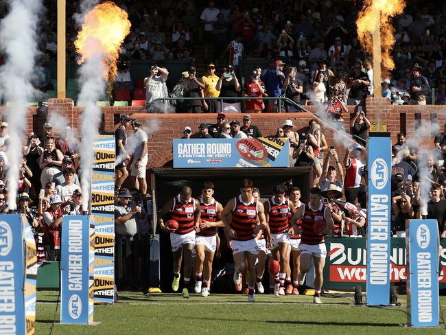 ADELAIDE, AUSTRALIA - APRIL 13: Saints run out onto Norwood Oval during the Gather Round AFL match between St Kilda and the GWS Giants at Norwood Oval, on April 13, 2025, in Adelaide, Australia. (Photo by Maya Thompson/AFL Photos/Getty Images)