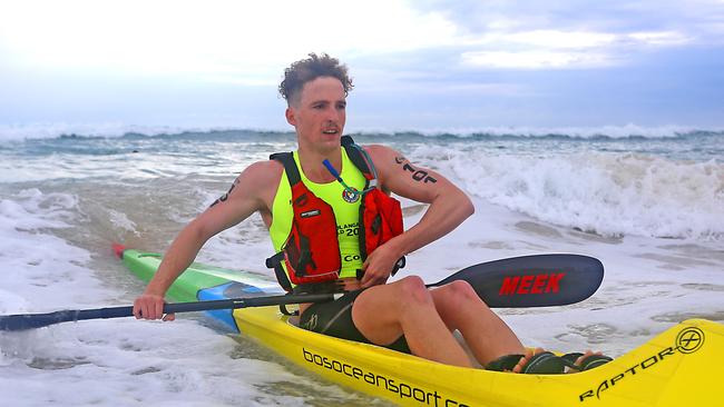 Coolangatta Gold shortcourse winner Thomas Gallagher coming into the beach on the ski. Photo: Harvpix