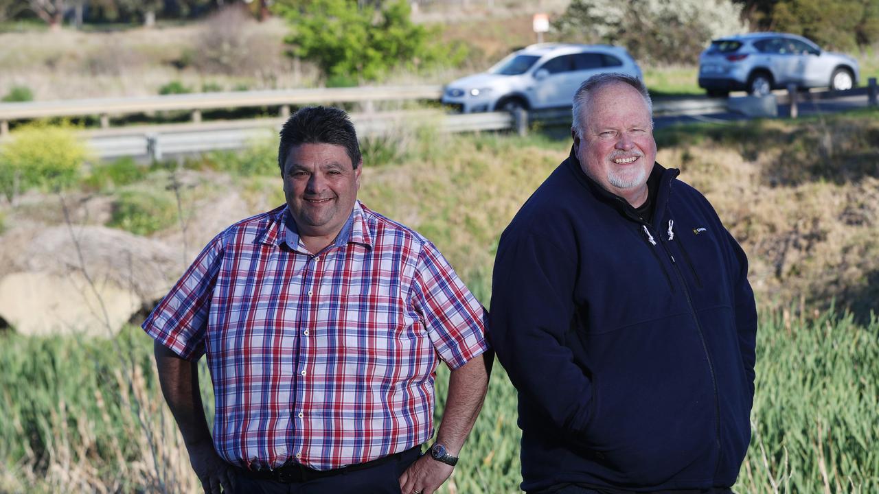 Deakin ward candidates Andrew Katos and Andy Richards and Andrew Kato pictured together at Waurn Ponds Creek. Picture: Alan Barber