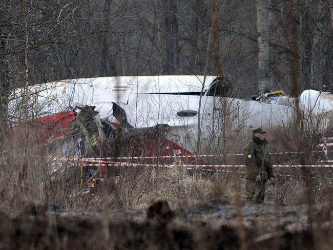 A Russian Interior Ministry soldier stands guard near the wreckage of a Polish government Tupolev Tu-154 aircraft. Picture: Supplied.