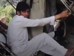 Astonishing new footage has captured the moment passengers held onto dear life inside a stranded cable car for 16 hours in Pakistan before they were rescued.