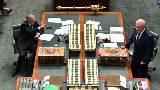 Opposition Leader Anthony Albanese reacts to Prime Minister Scott Morrison, right, during question time today. Picture: Getty Images