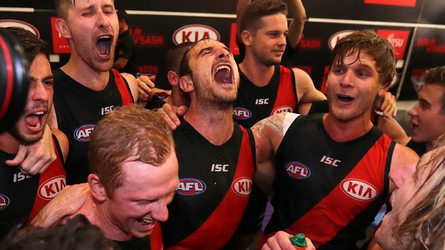 Jobe Watson enjoys singing the song for the first time in 671 days. Picture: Michael Klein