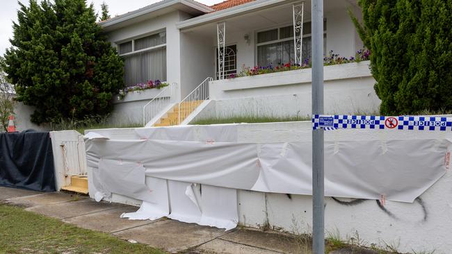 A house on Runic lane Maroubra has been spray painted with anti-Semitic messages, swiftly covered by school staff. Picture Thomas Lisson