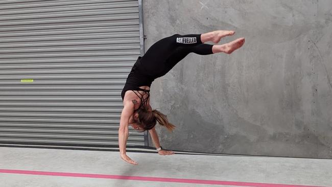 Leah Gardner, 24, performs a tumbling move during training. Picture: Contributed