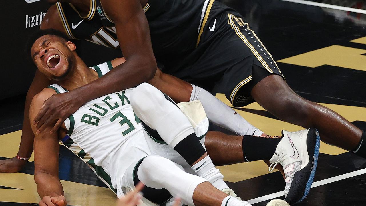 Bucks' Giannis Antetokounmpo avoids major knee injury, doubtful