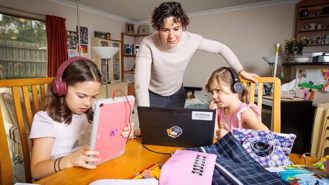 Bethany Holden is homeschooling her two daughters Kaitlyn, 7, and Eleanor, 5. Picture: Mark Stewart.