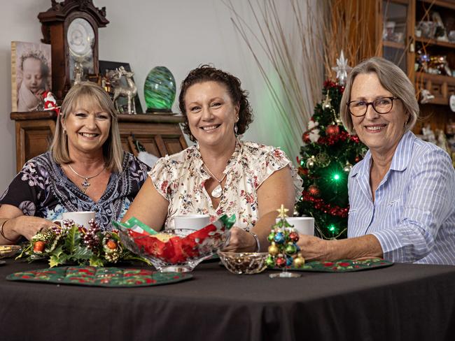 Leesa Newman, Kathleen Folbigg and Kylie Barry getting ready to celebrate Christmas together at Leesa's home in Charlestown. Picture: Adam Yip