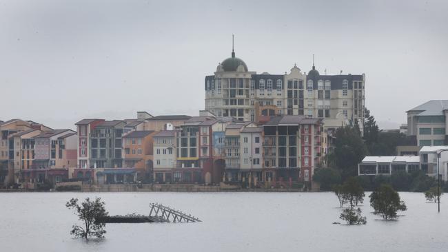 Flooding on the Gold coast in the aftermath of Cyclone Alfred. Emerald Lakes and Carrara go under. Picture Glenn Hampson