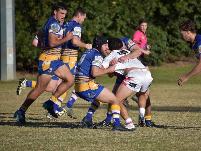 Paul O'Neill completes a tackle for Marist Brothers