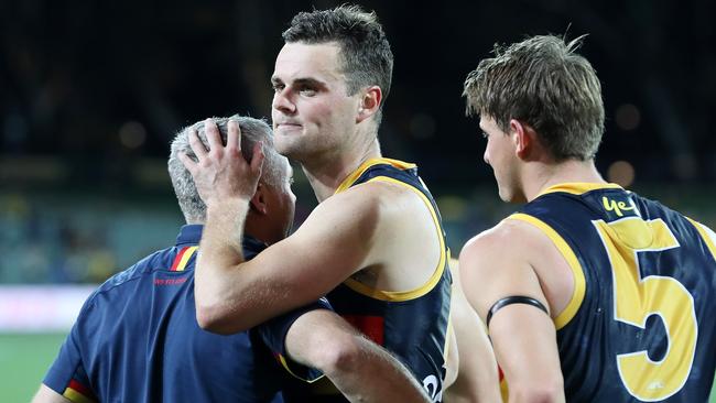 Brad Crouch (centre) after Adelaide’s final game of the season. Picture: Sarah Reed.