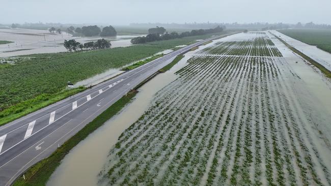 The Queensland Rail tracks remain underwater and will need to be inspected for damage before railway services to Cairns can resume. Picture: Brendan Radke