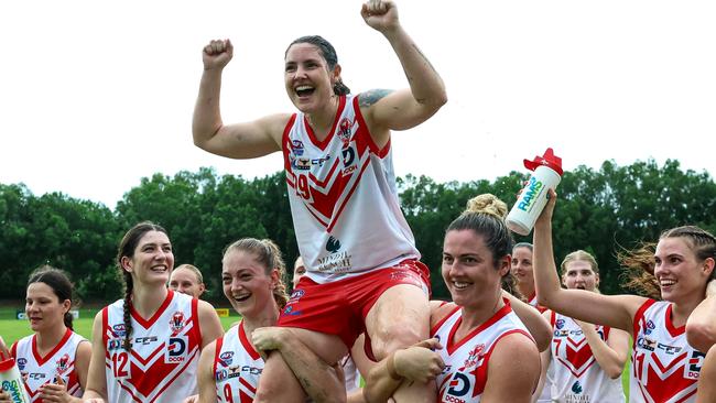 Tarryn O'Hehir carried off the field in her 100th cap for the Waratah Footy Club. Picture: Celina Whan / AFLNT Media.