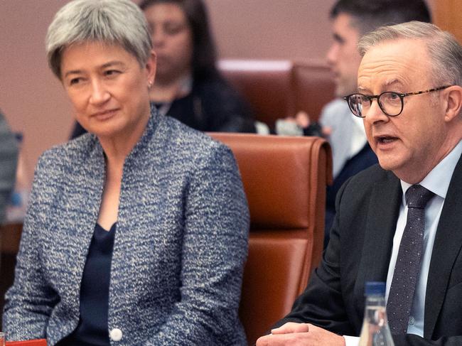 Australiaâs Prime Minister Anthony Albanese (R) speaks as he sits next to Australiaâs Minister for Foreign Affairs Penny Wong during a meeting with Papua New Guineaâs Prime Minister James Marape in Parliament House in Canberra on December 7, 2023. Australia signed a security deal with Papua New Guinea on December 7, bolstering ties to a key Pacific neighbour that has been courted persistently by China. (Photo by HILARY WARDHAUGH / AFP)
