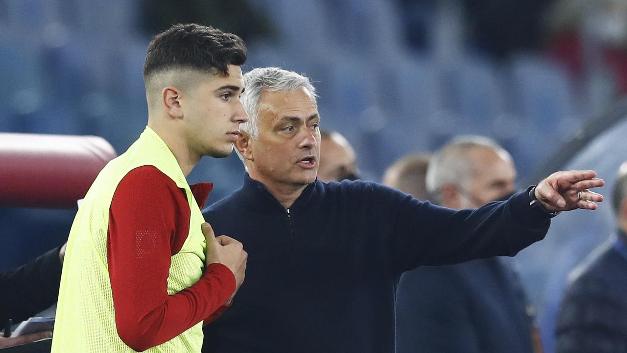 Chritian Volpato gets instructions from Roma boss Jose Mourinho.