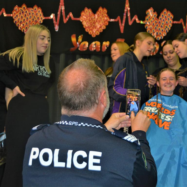 At the St Joseph's College 2023 World's Greatest Shave event is Jordan Steinhardt surrounded by her support crew. Picture: Rhylea Millar