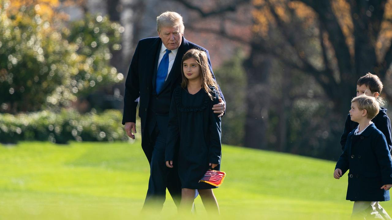 Donald Trump arrives at the White House with his grandchildren. Picture: Alex Edelman/AFP