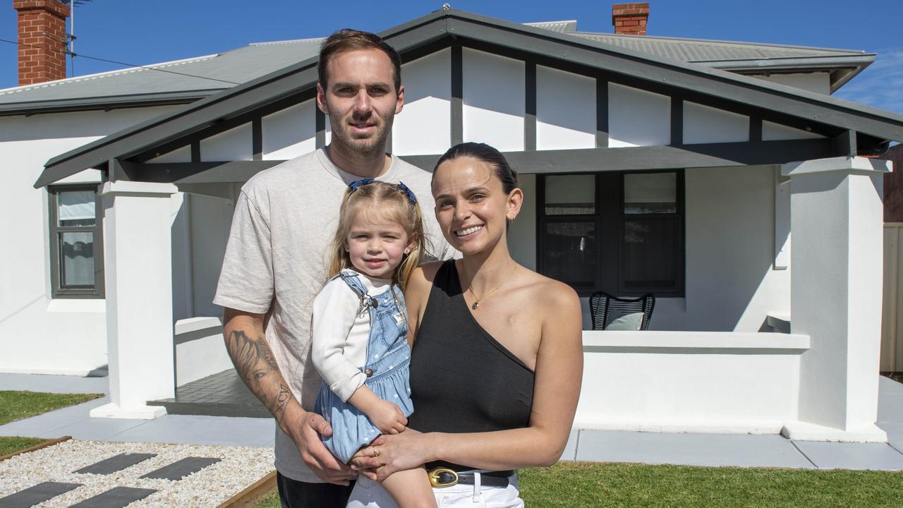 Kellie and Jeremy Finlayson with their daughter Sophia, 3, in their Hendon home, which they put on the market. Picture: Mark Brake.