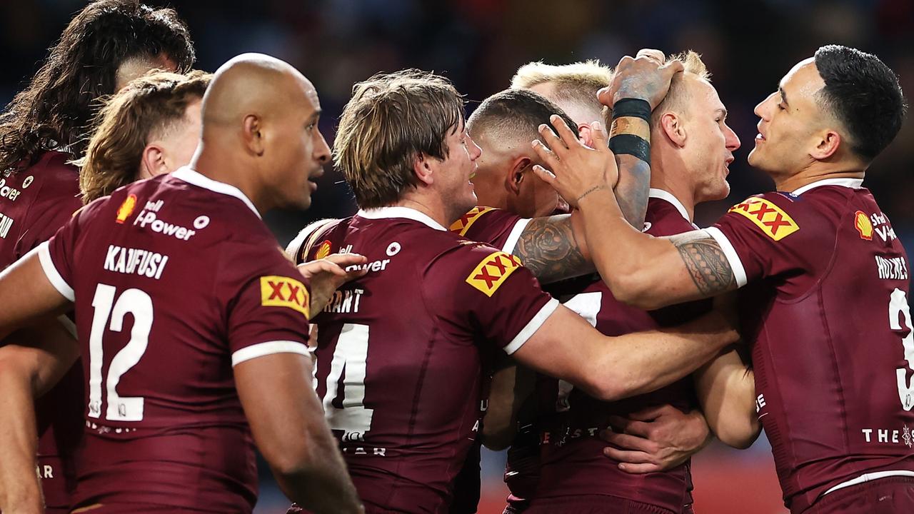 Queensland players celebrate on Wednesday night. Picture: Getty Images