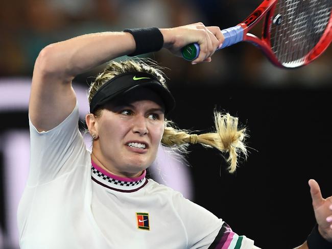 Canada's Eugenie Bouchard hits a return against Serena Williams of the US during their women's singles match on day four of the Australian Open tennis tournament in Melbourne on January 17, 2019. (Photo by Jewel SAMAD / AFP) / -- IMAGE RESTRICTED TO EDITORIAL USE - STRICTLY NO COMMERCIAL USE --