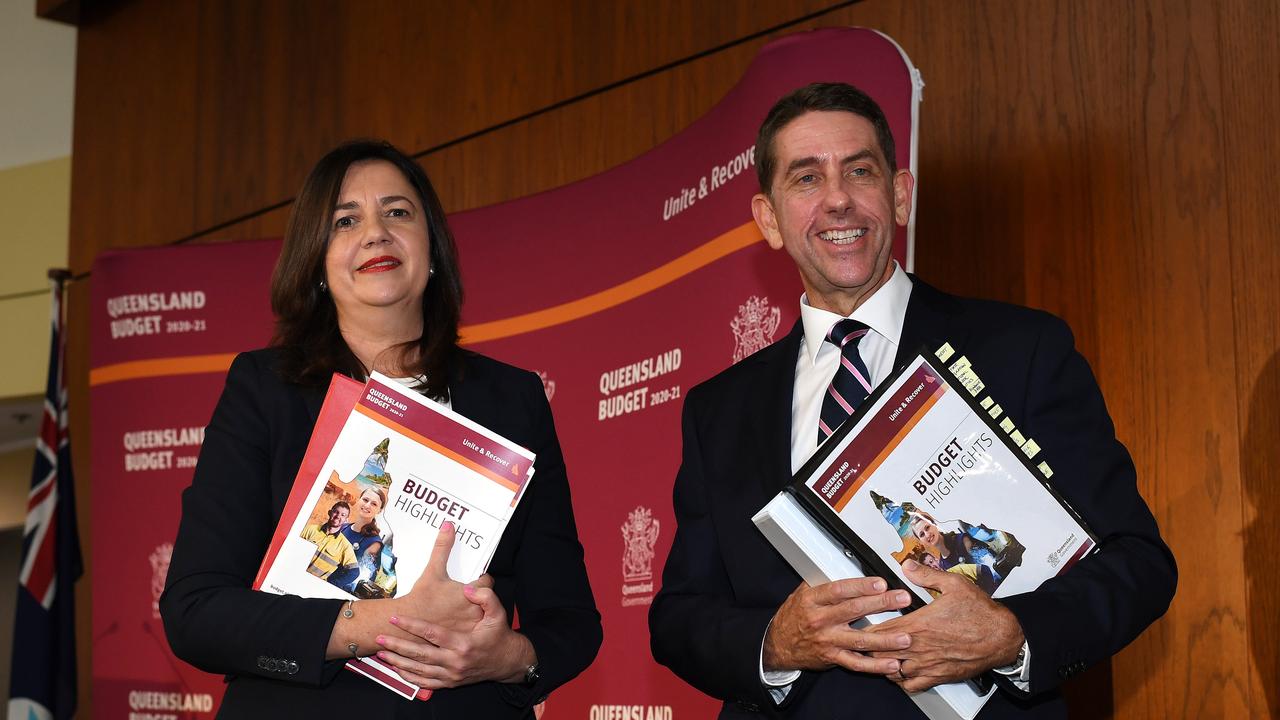 Queensland Premier Annastacia Palaszczuk and Treasurer Cameron Dick pose for a photo after a press conference during the Queensland Budget lockup at Parliament House. Picture: NCA NewsWire / Dan Peled