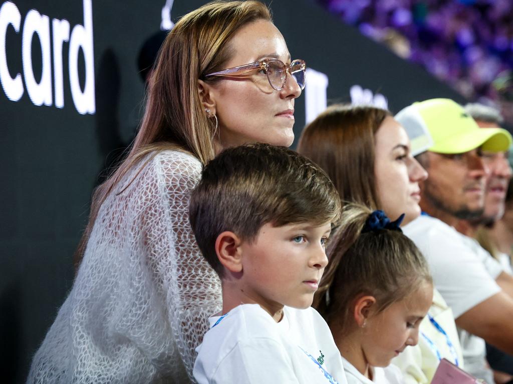 Jelena Djokovic (L) with her son Stefan and daughter Tara at the Australian Open.