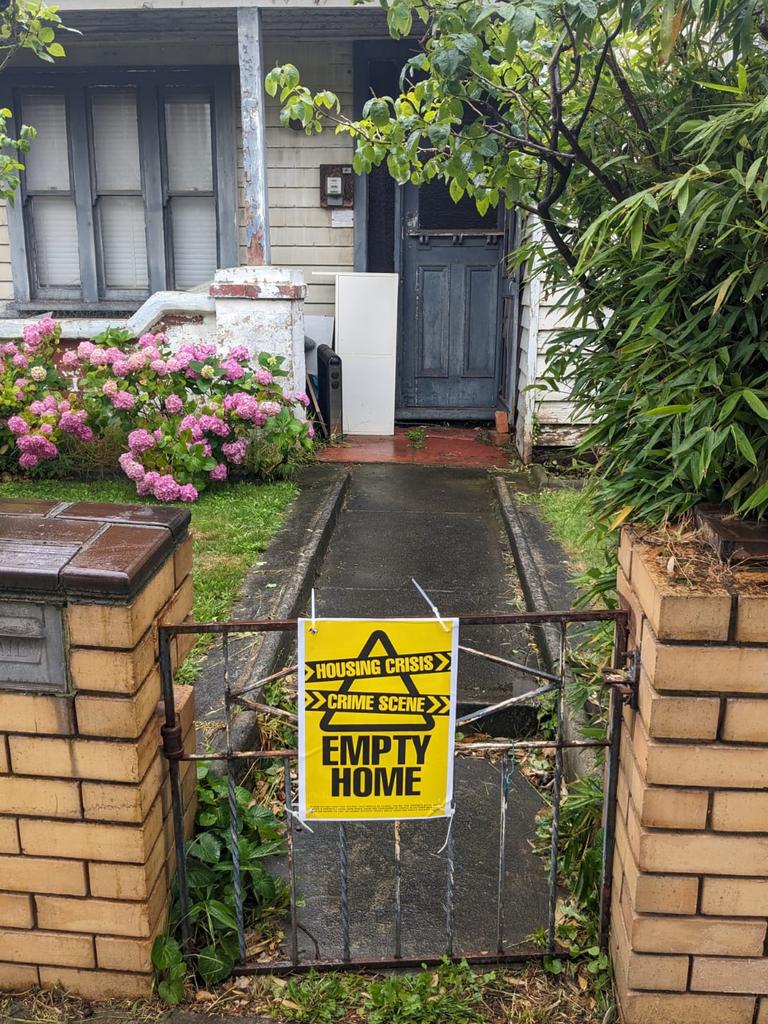 Another Brunswick home with a campaign sticker attached to its gate.