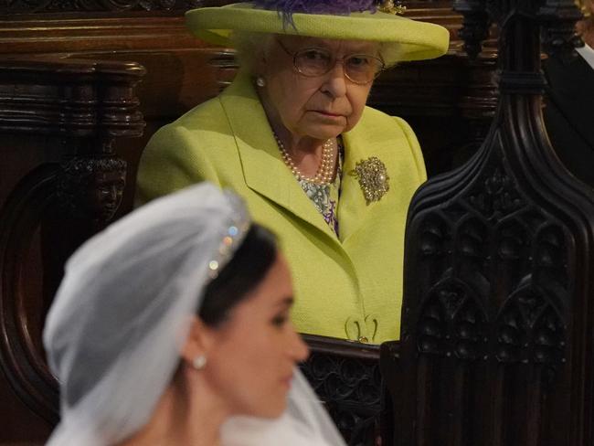 Meghan (front) and the Queen during last month’s royal wedding. Picture: AFP