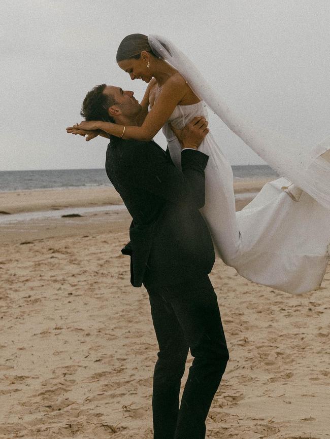 Port Adelaide star Jeremy Finlayson and his wife Kellie Finlayson were married at Tennyson Beach, South Australia. Picture: @bambiphoto_