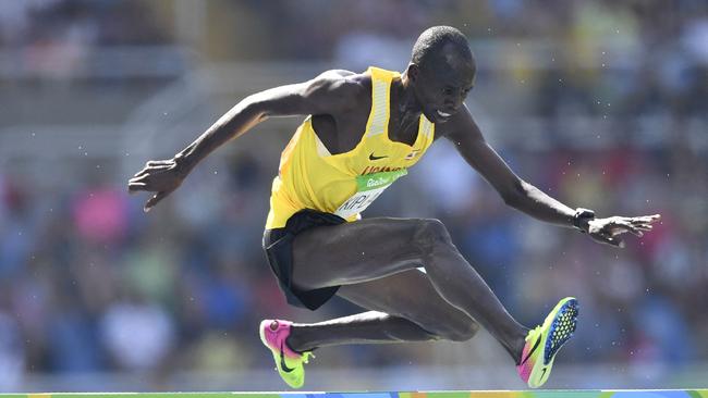 Uganda's Benjamin Kiplagat competes in the Men's 3000m Steeplechase at the Rio 2016 Olympics. Photo by Fabrice COFFRINI / AFP.