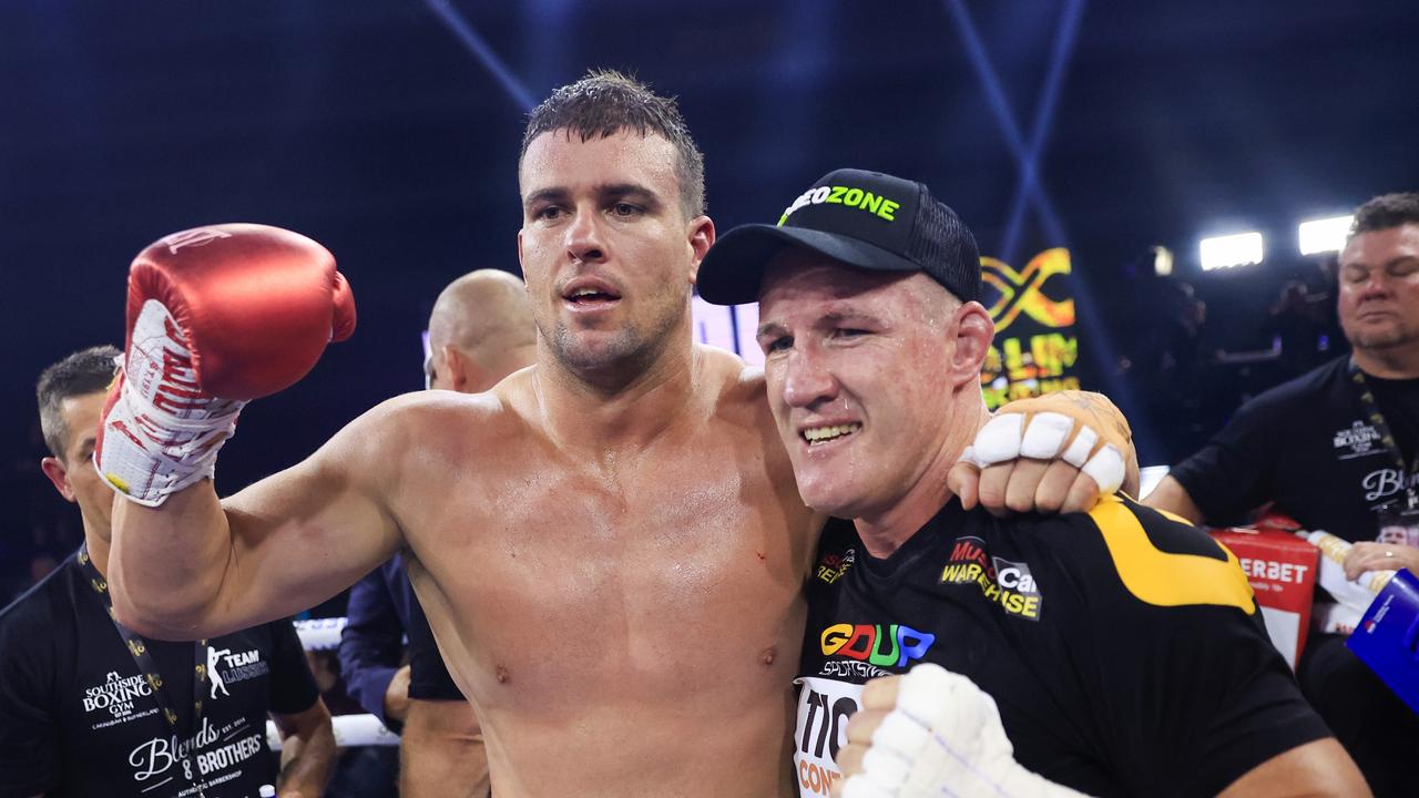 Paul Gallen (R) poses for a photo with Darcy Lussick after winning their fight. Picture: Mark Evans/Getty