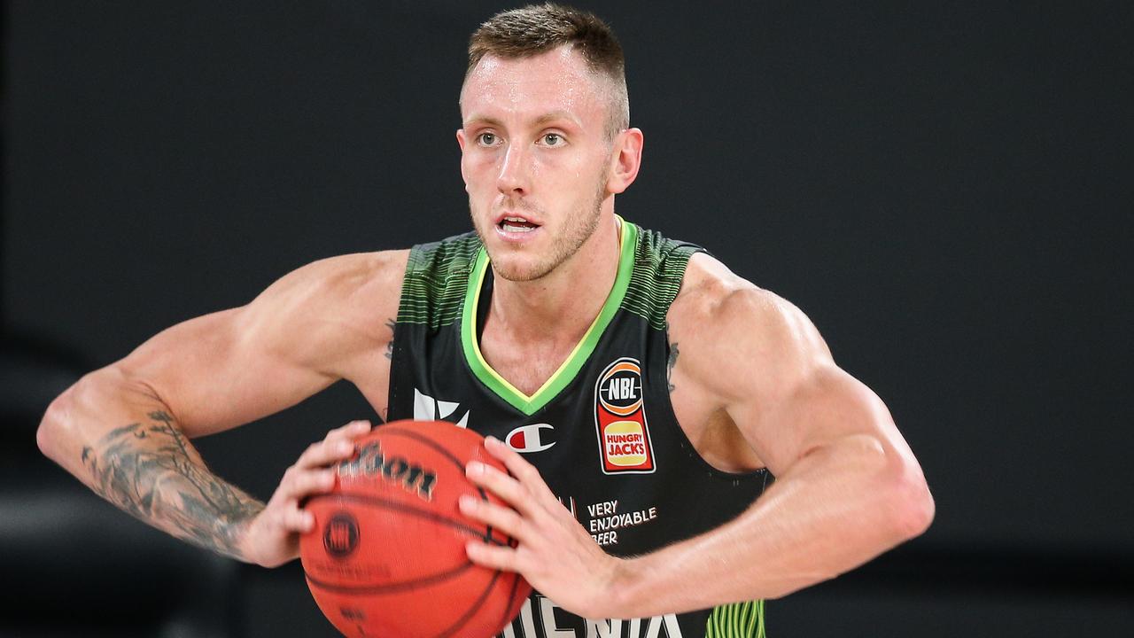 Australian basketball star Mitch Creek has been charged over an alleged assault.
