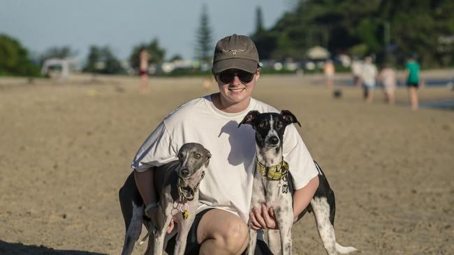 Jessie Hogan with Winston and Luna at Palm Beach off leash area. Picture: Glenn Campbell