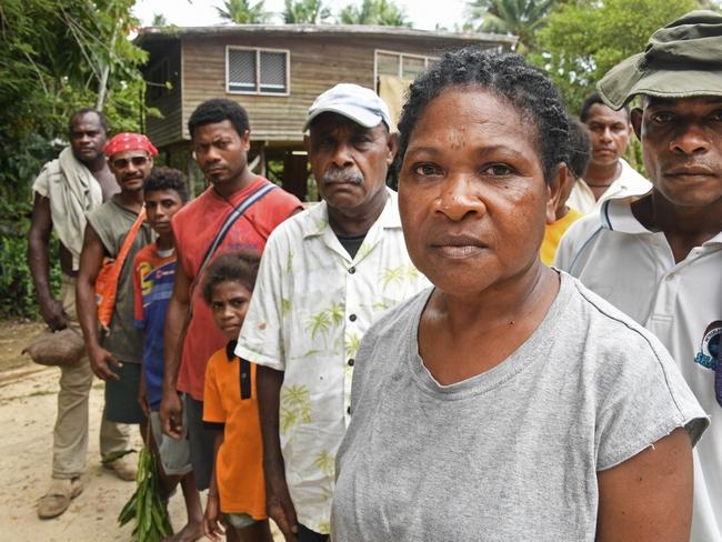 Marsina Peter (foreground) with other villagers, who have lost jobs at the detention centre. Picture: Brian Cassey