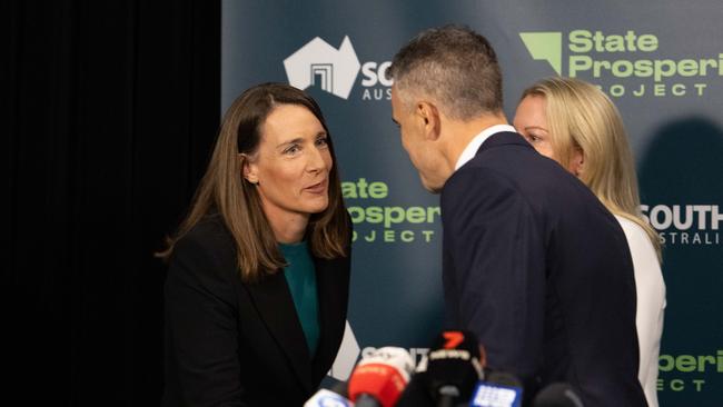 Anna Wiley, BHP vice president of planning and technical for minerals Australia, shakes hands with Premier Peter Malinauskas at a press conference to announce a financial commitment to progress plans for Northern Water. Picture: NCA NewsWire / Morgan Sette