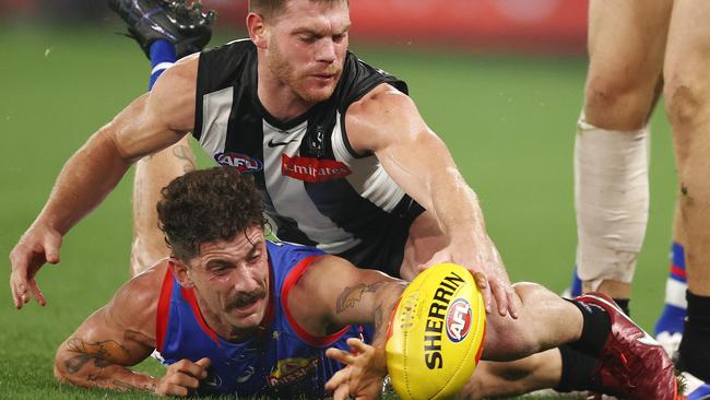 Tom Liberatore and Taylor Adams fight for the ball in the opening quarter. Picture: Michael Klein