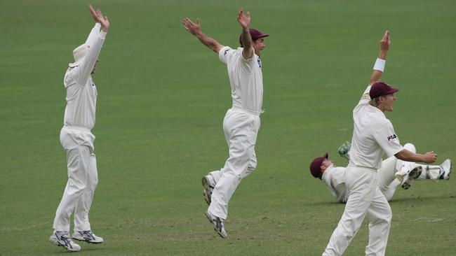 Andy Bichel, Martin Love,Jimmy Maher and Shane Watson celebrate Chris Hartley’s catch.