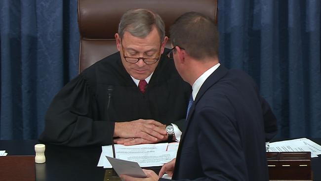 US Supreme Court Chief Justice John Roberts declares the Donald Trump acquitted of the first impeachment charge. Picture: AFP.