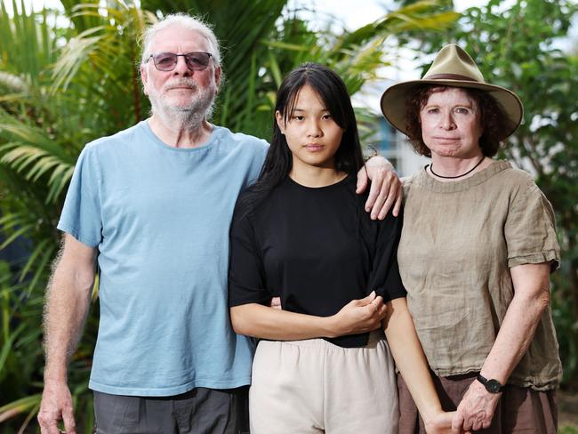 Cairns woman Melody Neal, 19, was stabbed seven times in the school yard of Peace Lutheran College by a fellow student in May 2023. Last week the perpetrator was found to be of unsound mind by a mental health court in Brisbane, meaning he will never face a criminal trail for the attack. Melody Neal at home in Trinity Beach with her parents Stewart Neal and Sharon Guest. Picture: Brendan Radke