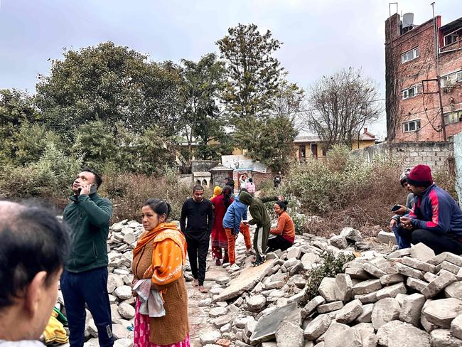 People gather in an open area following earthquake tremors in Kathmandu. Picture: AFP