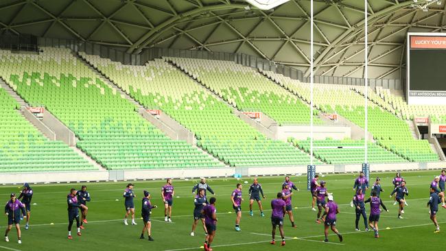 Melbourne Storm train in front of empty stands at AAMI Park in preparation for the NRL’s return.