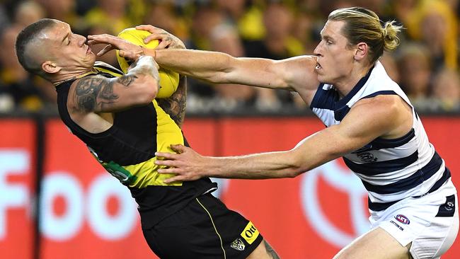 Dustin Martin and Mark Blicavs do battle in last year’s preliminary final. Picture: Quinn Rooney/Getty Images via AFL Photos