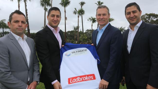 Bulldogs CEO Andrew Hill with Ultimate Security CEO Nassim Said and COO Nabil Said.