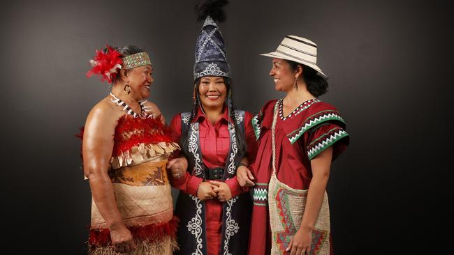 Loni Kube, originally from Samoa, Cholpon Tabyldieva, originally from Kyrgyzstan, and Ana Carolina Ceballos, originaly from Panama, who are all participants in the project 177 Nations of Tasmania by Mark Thomson and Andrew Wilson. Picture: Nikki Davis-Jones